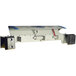 A metal Bluff Manufacturing dock leveler with a blue and black surface and a blue handle.