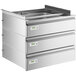 A Regency stainless steel triple-stacked drawer set on a metal counter with white labels on the drawers.