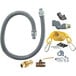 A Dormont ReliaGuard gas hose kit with a grey hose and yellow fittings and other parts.