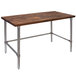 A John Boos walnut wood top work table with a galvanized metal base.