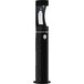 An Elkay black outdoor pedestal bottle filling station with a white label.