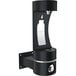 A black Elkay outdoor wall mount bottle filling station with a silver button.
