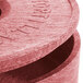 An 8" red polyethylene tortilla server with a lid on a table.