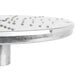 A Robot Coupe 1/16" grating/shredding disc, a circular metal surface with holes.