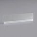 A clear rectangular glass shelf with a white border.