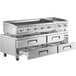 A Cooking Performance Group stainless steel chef base with drawers.