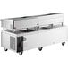 A Cooking Performance Group stainless steel refrigerated chef base with a gas griddle and charbroiler.