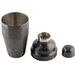 A black stainless steel Tablecraft cocktail shaker with acid etching finish and two metal cups.