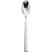 A silver spoon with a white handle.