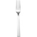 A silver fork with a white handle.