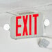 A white rectangular Lavex exit sign with red text.