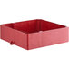 a red plastic box with holes