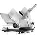 A Bizerba heavy-duty meat slicer with a metal cover slicing meat.