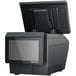A black Bizerba XC Series PC Receipt and Scale Label Printer with a grey screen on a counter.