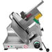 A Bizerba meat slicer with a green and red handle.