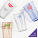 A group of empty Cambro plastic tumblers on a white background.