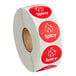 A roll of red and white Point Plus Spicy retail stickers.