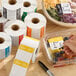 A set of removable day of the week label rolls used for food storage and organization.