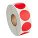 A roll of red Point Plus blank labels with white dots and borders.