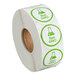 A roll of white paper with green and white Point Plus labels.