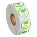 A roll of white paper with green and white Point Plus stickers.