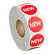 A roll of white paper with red and white Point Plus New labels.