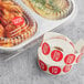 a roll of labels and food in containers