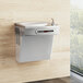 An Elkay stainless steel wall mounted chilled drinking fountain with a faucet.