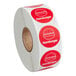 A roll of Point Plus Hamburger stickers with a red label.