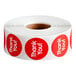 A white roll of Point Plus Thank You stickers with red circles and words.