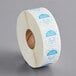 a roll of white paper with blue and white labels