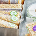 A pile of rice cakes with Point Plus green labels on them.