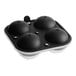 A black round ice mold with four compartments.