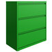 A green three drawer filing cabinet.