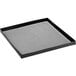 A black square Baker's Mark mesh tray with a white grid pattern.