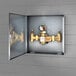 A stainless steel box with a Guardian Equipment thermostatic mixing valve inside.