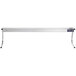 A stainless steel rectangular metal strip warmer with toggle controls on a table.