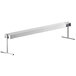 A long white metal ServIt strip warmer with adjustable legs.