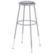 A National Public Seating gray lab stool with a padded round seat and adjustable gray legs.