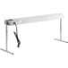 A white rectangular ServIt strip warmer with a black cord.