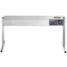 A silver stainless steel ServIt strip warmer with knobs on a table.