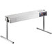 A silver rectangular ServIt strip warmer with a button on top.