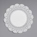 A white round paper doily.