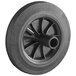 A close-up of a black Lavex wheel with a metal center.