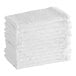 A stack of white Choice terry bar towels.