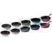 A row of Valor Galaxy Blue enameled mini cast iron skillets.