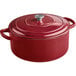 A Valor merlot enameled cast iron Dutch oven with a lid.