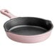 a pink and black skillet