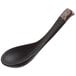 A black Acopa stoneware soup spoon with a brown handle.