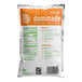 A bag of DominAde Orange Drink Mix on a white background.